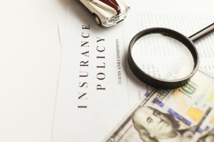 Insurance policy documents representing insurance coverage and costs