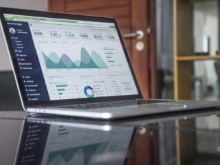 Laptop displaying online marketing analytics and campaign performance